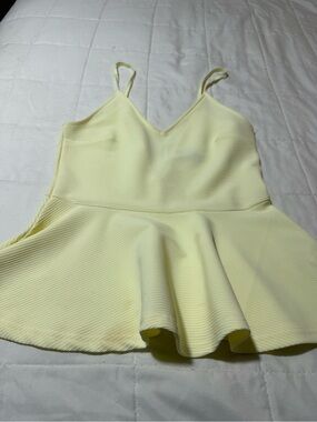 Pale Yellow Ribbed Peplum Cami with Spaghetti Straps